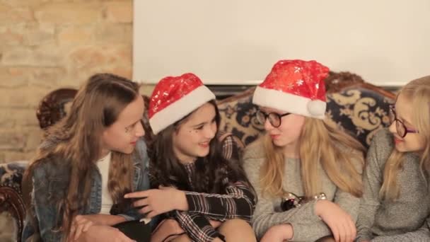 A group of little girls uses a smartphone — Video Stock