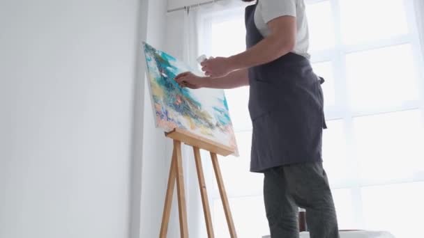 Young Male Artist Works Studio Uses Bright Paint Large White — Stockvideo