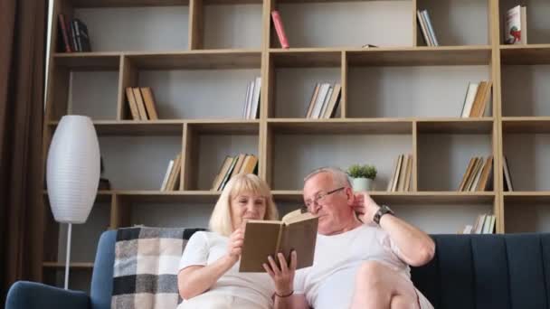 Happy Grandfather Grandmother Reading Book Enjoying Leisure Time Hobby Together — Wideo stockowe