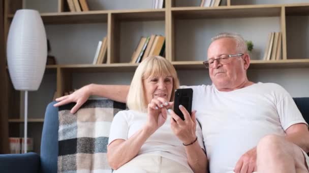 Happy Elderly Married Couple Sitting Living Room Chatting Online Relatives — 图库视频影像