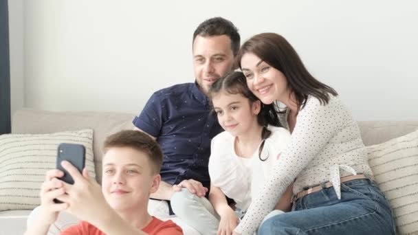 Happy Young Family Children Sitting Sofa Making Selfie Family Time — Video