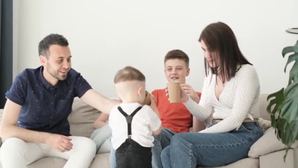 Happy Friendly Family Three Children Drinking Tea Living Room Family — Stock video