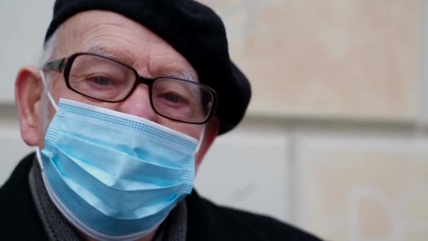 Portrait Old Grandfather Protective Mask Viruses Looks Camera Threat Influenza — Stock Video