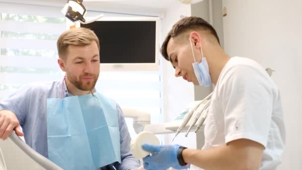 Young Handsome Patient Dental Office Dentist Patient Proper Dental Care — 图库视频影像