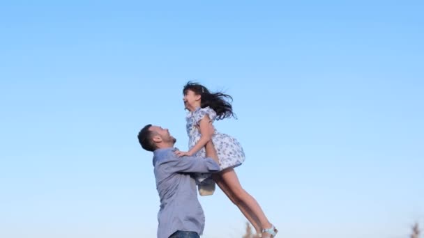 Happy Young Dad Kicks His Daughter Dad Little Daughter Hugging — Stock video