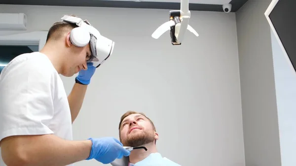 Dental treatment through virtual reality glasses. Medical technologies of the future