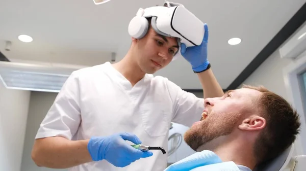 Young Girl Dentist Treats Teeth Virtual Reality Glasses Modern Worldview — ストック写真