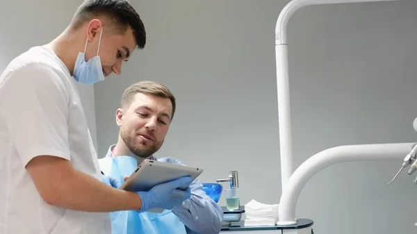 Young Patient European Appearance Sitting Dental Chair Talking Dentist Modern — 图库照片