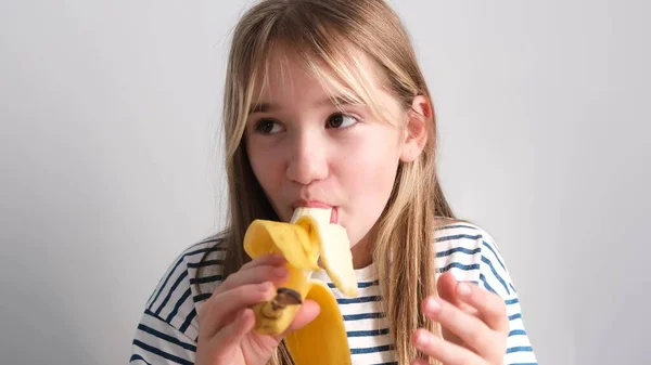 Happy Little Girl Eating Yellow Banana Year Old Girl Eats — Stock Photo, Image