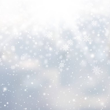 Winter snowfall and snowflakes on light blue background. Xmas and New Year background. Vector illustration