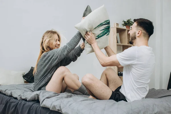 Portrait Happy Loving Couple Having Pillow Fight Bed — Stock Photo, Image
