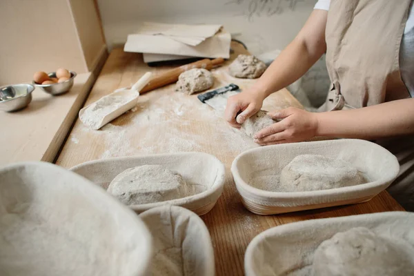 Woman Baker Kneads Dough Puts Wooden Form Bakery Concept — Zdjęcie stockowe