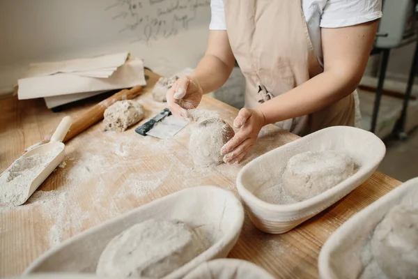 Woman Baker Kneads Dough Puts Wooden Form Bakery Concept — Zdjęcie stockowe