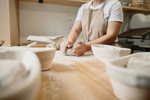 Woman Baker Kneads Dough Puts Wooden Form Bakery Concept — Stock Photo, Image