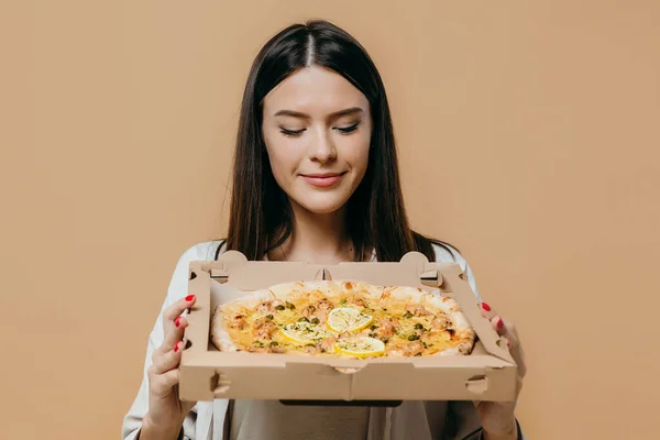 Joyful Brunette Woman Tasty Pizza Isolated Beige Background — ストック写真