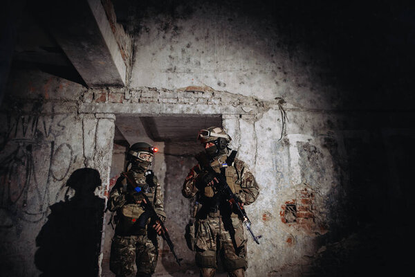 Ukrainian soldiers on the battlefield. Special forces conduct reconnaissance on enemy territory.