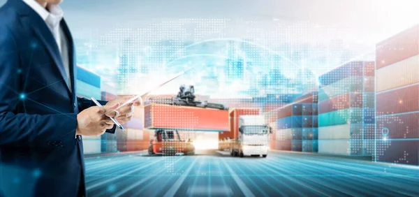 Global business network distribution of Container truck at port cargo, Businessman using tablet strategy data delivery and smart technology concept, Logistics import export transportation background