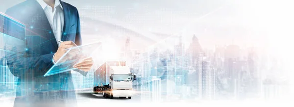 Business and Technology of Logistics Transport Concept, Double Exposure of Business Man using tablet control delivery network distribution import export on city map background, Future Transportation