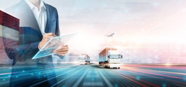 Business and Technology Digital Future of Cargo Containers Logistics Transport Concept, Double Exposure of Business man using Tablet and Freight Truck at Port, Transportation Import Export Background