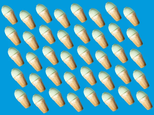Wallpaper or wrap of goods. Image with ice cream waffle cups on a blue background — Stock Photo, Image