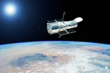 Dünya yörüngesindeki uzay teleskopu. Bu görüntünün elementleri NASA tarafından döşendi. Yüksek kalite fotoğraf