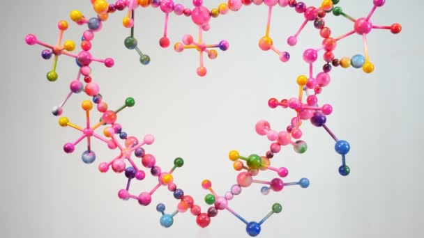 Fechar Forma Coração Colorido Feito Com Bolas Coloridas — Vídeo de Stock