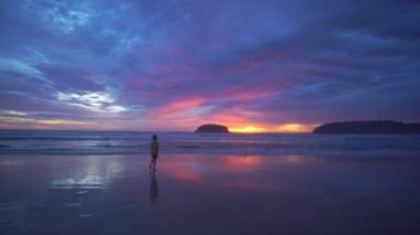 scenery sweet sky the sun down to the sea..beautiful sky at sunset in Kata beach Phuket Thailand.4k stock footage video in travel concept. sweet sky background.