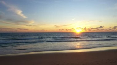 aerial view beautiful sunset above Karon beach Phuket.scenery sunlight on the horizon.Scene of Colorful light in the sky background.