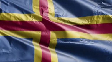 Aland bayrağı rüzgarda dalgalanıyor. Aland bayrağı rüzgarda sallanıyor. Tam dolgu arkaplanı. 10 saniye döngü. 
