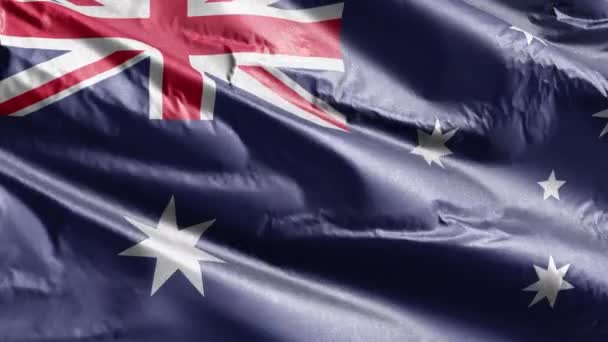 オーストラリアの繊維の旗は 風の輪の上でゆっくりと振っています オーストラリアのバナーをスムーズに風に揺れる 繊維組織だ 完全充填の背景 20秒ループ — ストック動画