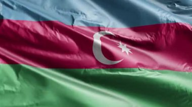 Rüzgarda dalgalanan Azerbaycan bayrağı. Azerbaycan bayrağı rüzgarda sallanıyor. Tam dolgu arkaplanı. 10 saniye döngü. 
