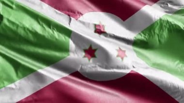 Burundi tekstil bayrağı rüzgarda sallanıyor. Burundian bayrağı rüzgarda sallanıyor. Kumaş dokular. Tam dolgu arkaplanı. 10 saniye döngü. 