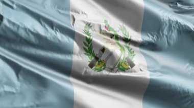 Guatemala bayrağı rüzgar döngüsünde yavaşça dalgalanıyor. Guatemala bayrağı rüzgarda sallanıyor. Tam dolgu arkaplanı. 20 saniye döngü. 