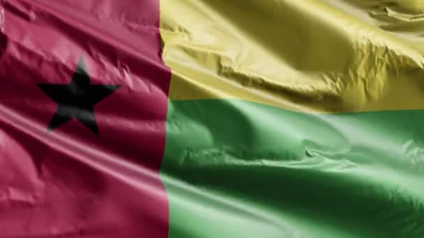 几内亚比绍的国旗在风向上飘扬 几内亚比绍的旗帜在微风中摇曳 完整的背景 10秒回圈 — 图库视频影像