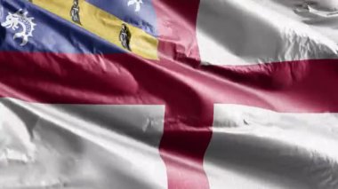 Rüzgar çemberinde sallanan Herm tekstil bayrağı. Herm bayrağı rüzgarda sallanıyor. Kumaş dokular. Tam dolgu arkaplanı. 10 saniye döngü. 