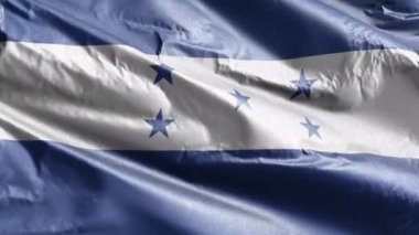 Honduras tekstil bayrağı rüzgar döngüsünde yavaşça dalgalanıyor. Honduras bayrağı rüzgarda hafifçe sallanıyor. Kumaş dokular. Tam dolgu arkaplanı. 20 saniye döngü. 