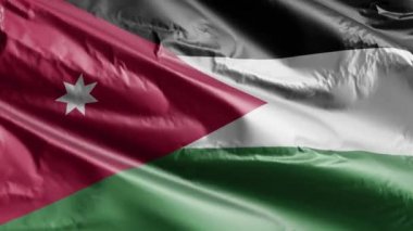 Jordan bayrağı rüzgarda yavaşça dalgalanıyor. Jordan afişi rüzgarda hafifçe sallanıyor. Tam dolgu arkaplanı. 20 saniye döngü. 