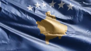 Kosova tekstil bayrağı rüzgar döngüsünde dalgalanıyor. Kosovsky bayrağı rüzgarda sallanıyor. Kumaş dokular. Tam dolgu arkaplanı. 10 saniye döngü. 