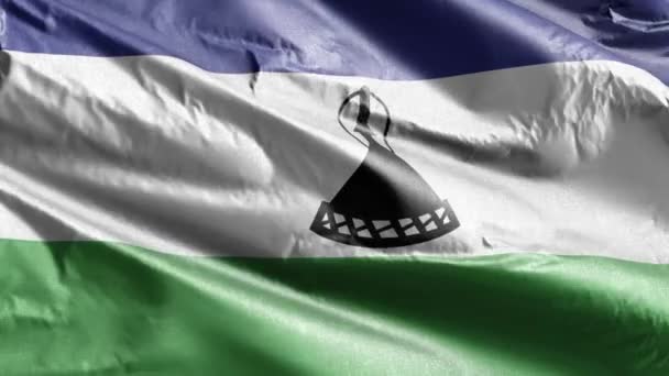 莱索托的纺织品国旗在风向上缓缓飘扬 莱索托的旗帜在微风中飘扬 织物织物织物组织 完整的背景 20秒回圈 — 图库视频影像