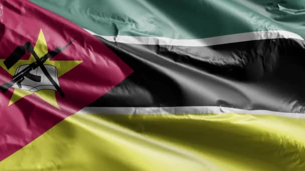 モザンビークの国旗はゆっくりと風の輪を振っている 風に揺れるモザンビークの旗 完全充填の背景 20秒ループ — ストック動画