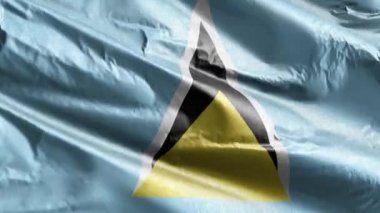 Saint Lucia tekstil bayrağı rüzgarda sallanıyor. Aziz Lucia bayrağı rüzgarda sallanıyor. Kumaş dokular. Tam dolgu arkaplanı. 10 saniye döngü. 