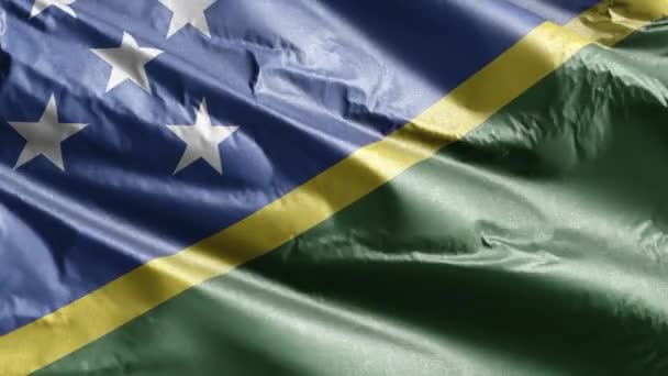 所罗门群岛的纺织品国旗在风向上缓缓飘扬 所罗门群岛的旗帜在微风中飘扬 织物织物织物组织 完整的背景 20秒回圈 — 图库视频影像