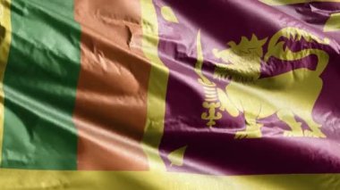 Sri Lanka tekstil bayrağı rüzgar döngüsünde yavaşça dalgalanıyor. Sri Lanka afişi rüzgarda sallanıyor. Kumaş dokular. Tam dolgu arkaplanı. 20 saniye döngü. 