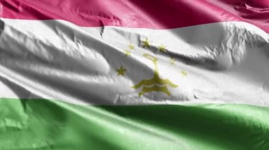 Tacikistan tekstil bayrağı rüzgarda yavaşça dalgalanıyor. Tacik bayrağı rüzgarda hafifçe sallanıyor. Kumaş dokular. Tam dolgu arkaplanı. 20 saniye döngü. 