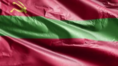 Transnistria tekstil bayrağı rüzgar döngüsünde yavaşça dalgalanıyor. Transnistria bayrağı rüzgarda sallanıyor. Kumaş dokular. Tam dolgu arkaplanı. 20 saniye döngü. 
