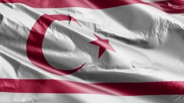 Kuzey Kıbrıs Türk Cumhuriyeti rüzgarda yavaş dalgalanan bayrak. Kuzey Kıbrıs Türk Cumhuriyeti bayrağı rüzgarda hafifçe sallanıyor. Tam dolgu arkaplanı. 20 saniye döngü. 