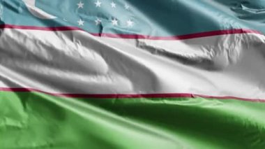 Özbekistan bayrağı rüzgâr çemberinde dalgalanıyor. Özbek bayrağı rüzgarda sallanıyor. Tam dolgu arkaplanı. 10 saniye döngü. 