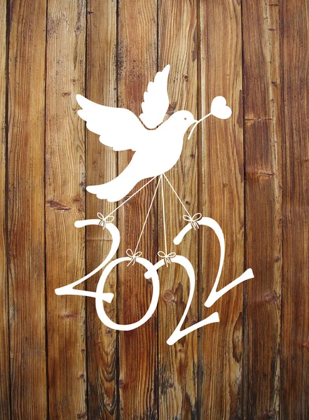 一只鸽子带着2022年的数量来迎接新的一年 — 图库照片