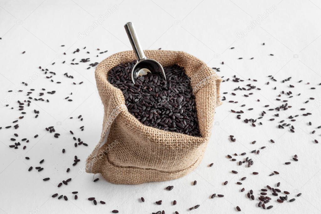 Black venereal rice in a hessian bag
