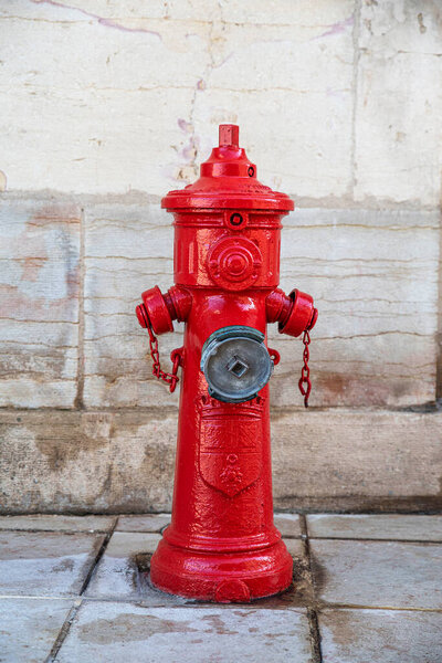 Close-up of a red fire hydrant in the city